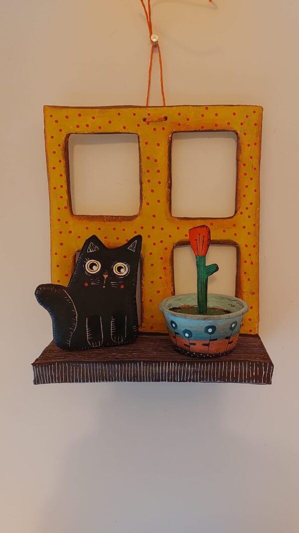 Finestrella gattino con fiore